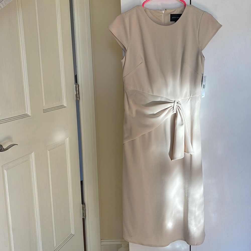 Beautiful ivory dress with cap sleeve